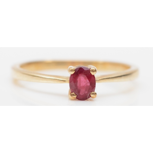 398 - A 9ct gold ruby solitaire ring, O, 1.7gm.