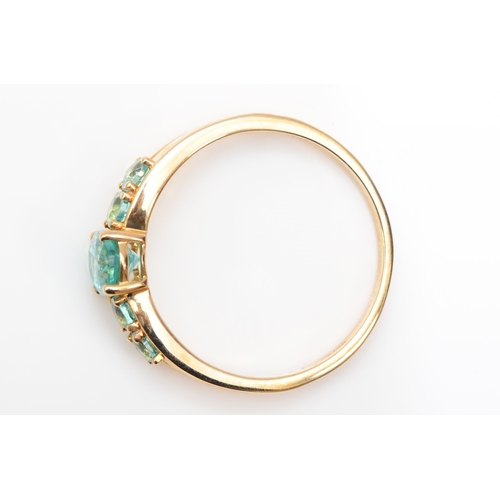 399 - A 9ct gold apatite dress ring, S, 2.8gm.