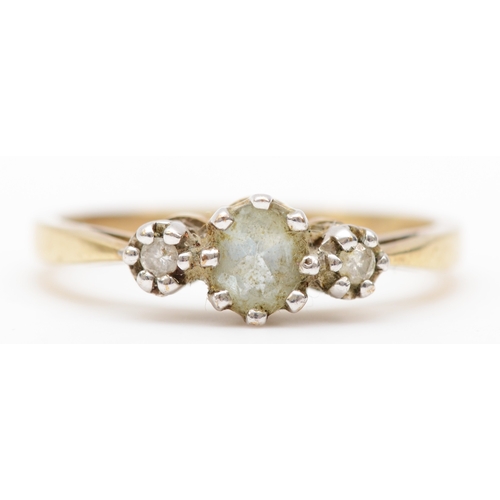 405 - A 9ct gold aquamarine and brilliant cut diamond ring, M-N, 1.8gm.