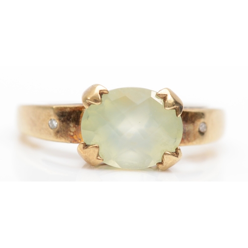 406 - A 9ct gold green gemstone cocktail dress ring, Q, 3.8gm.