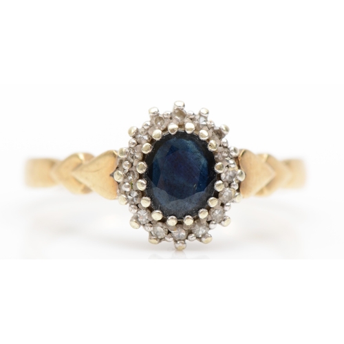 410 - A 9ct gold sapphire and diamond cluster ring, with heart shaped shoulders, O, 3gm.