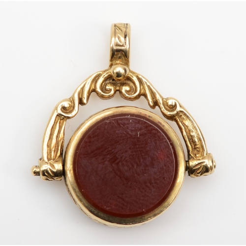 418 - A 9ct gold bloodstone and carnelian watch fob, 24 x 22mm, 5.5gm.