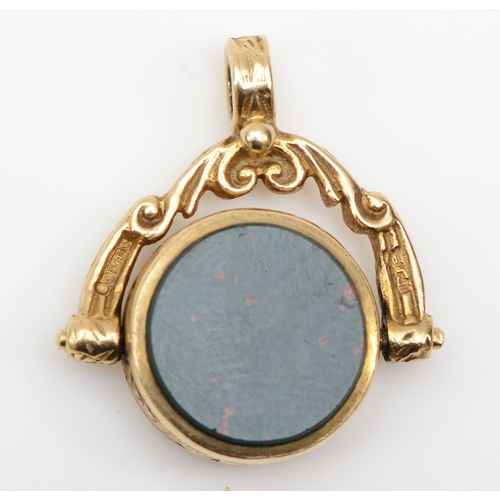 418 - A 9ct gold bloodstone and carnelian watch fob, 24 x 22mm, 5.5gm.