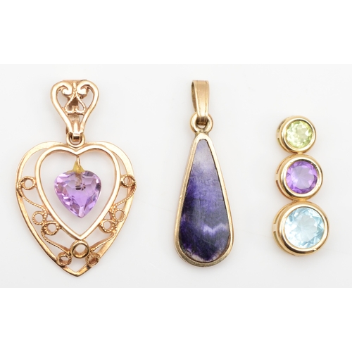 420 - A 9ct gold teardrop Blue John pendant, 24 x 7mm, together with two unmarked gold pendants, 2.8gm.