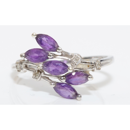 424 - A 9ct white gold amethyst and diamond dress ring, T, 2.5gm.