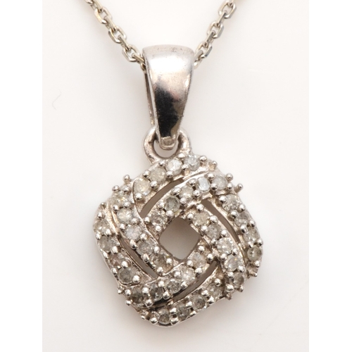 430 - An unmarked white gold diamond cluster pendant, on chain , 18 x 11mm, 3.2gm.