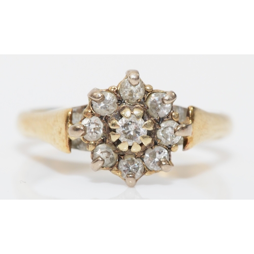 431 - An unmarked gold brilliant cut diamond cluster ring, J, 2gm.