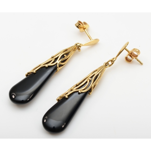 482 - A pair of 9ct gold onyx drop earrings, 48mm, 6.2gm.