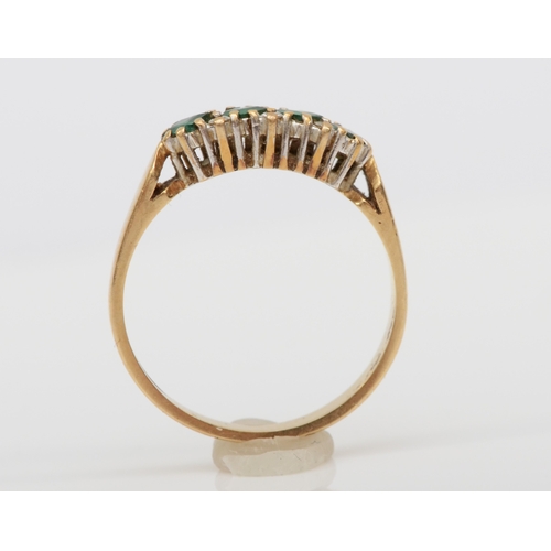 484 - A 9ct gold emerald and diamond dress ring, O, 2.3gm.