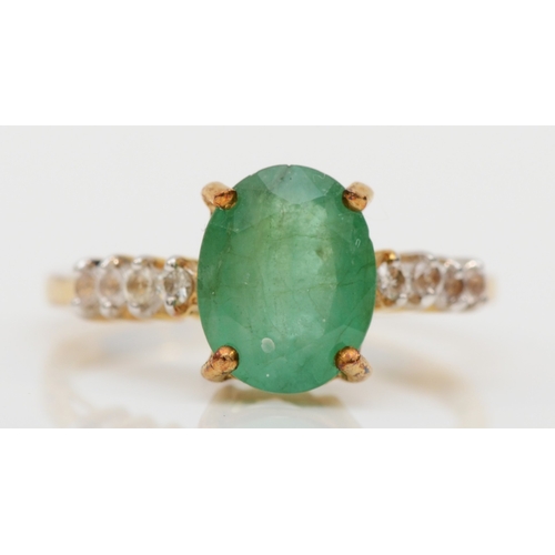 485 - A 9ct gold emerald and diamond dress ring, M, 2gm.