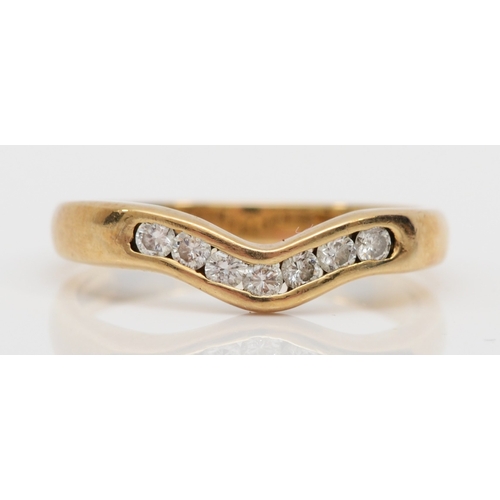 487 - A 9ct gold seven stone brilliant cut diamond ring, N-O, 2.2gm.