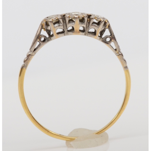 488 - An unmarked gold illusion set brilliant cut diamond ring, U, 2.5gm.