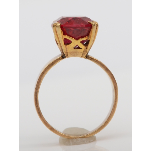 490 - A 9ct gold synthetic ruby cocktail dress ring, M, 5.8gm.