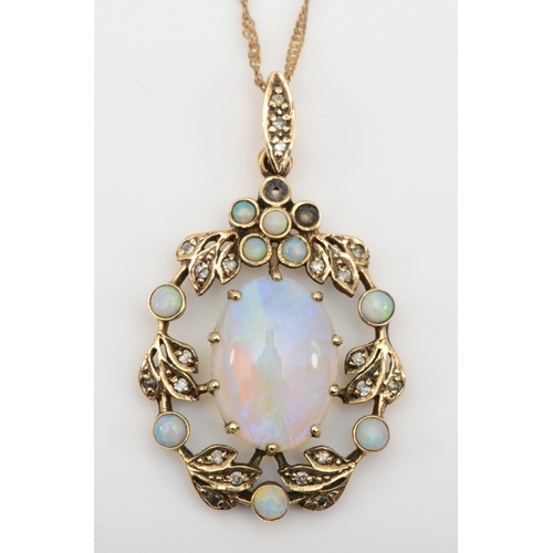 493 - A 9ct gold opal and diamond floral pendant, on chain, flashes of red, blue and green, 35 x 21mm, 4.7... 