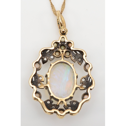 493 - A 9ct gold opal and diamond floral pendant, on chain, flashes of red, blue and green, 35 x 21mm, 4.7... 