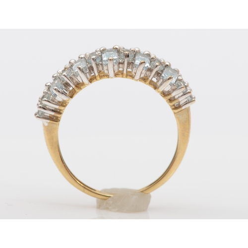 495 - A 9ct gold aquamarine and white sapphire dress ring, L, 2.5gm.