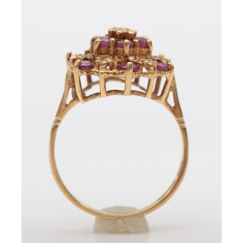 502 - A 9ct gold ruby and diamond cluster ring, O-P, 3gm.