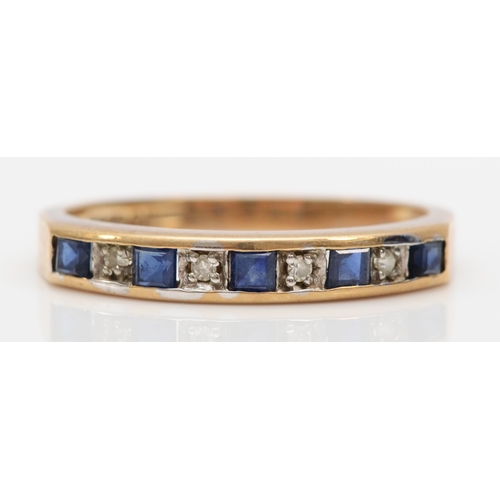 503 - A 9ct gold sapphire and diamond dress ring, O, 1.8gm.