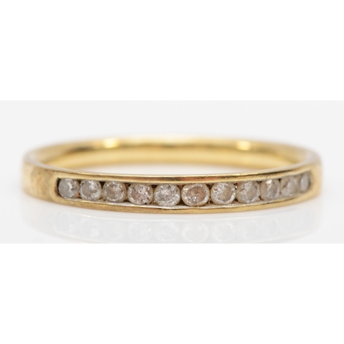 505 - A 9ct gold brilliant cut diamond half eternity ring, O-P, 1.6gm.