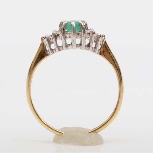 510 - A 9ct gold emerald and diamond dress ring, J, 1.3gm.