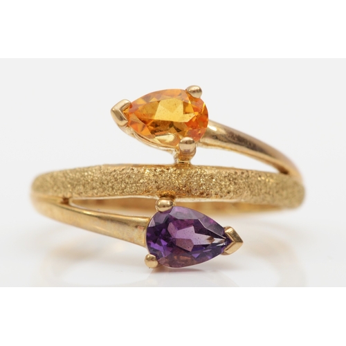 512 - A 9ct gold citrine and amethyst dress ring, L, 2.5gm.