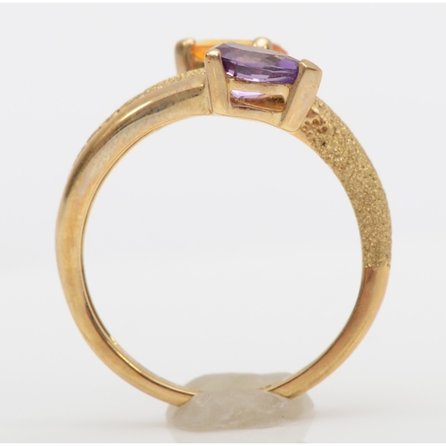 512 - A 9ct gold citrine and amethyst dress ring, L, 2.5gm.