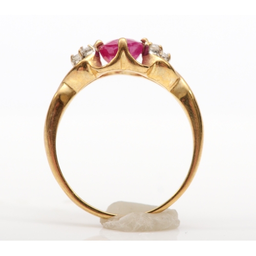 516 - A 9ct gold synthetic ruby and brilliant cut diamond dress ring, K, 2gm.