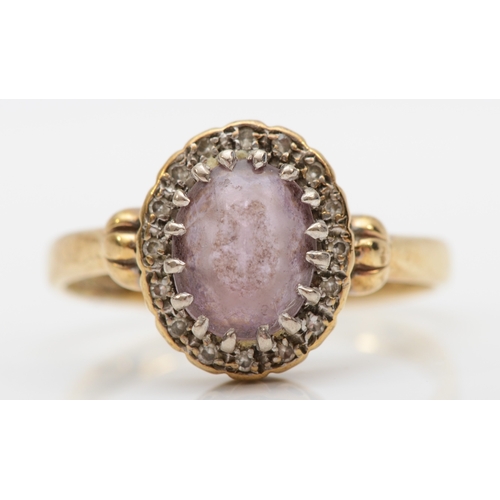 517 - A 9ct gold amethyst and diamond cluster ring, Q, 3gm.