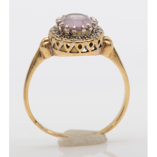 517 - A 9ct gold amethyst and diamond cluster ring, Q, 3gm.