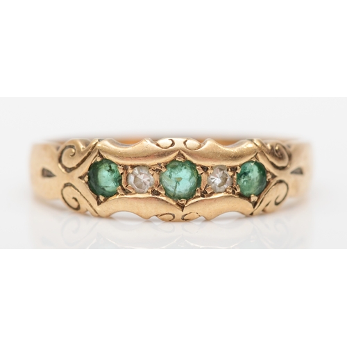 530 - A 9ct gold emerald and diamond dress ring, O, 2gm.