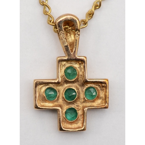 535 - A 9ct gold emerald cross pendant, on chain, 17 x 10mm, 2.6gm.