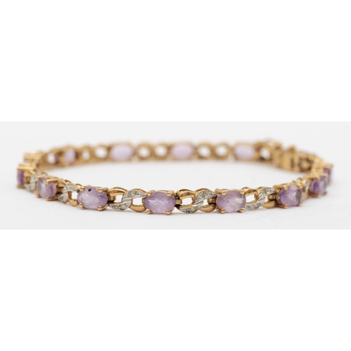 537 - A 9ct gold amethyst and diamond tennis bracelet, 19cm, 8.1gm