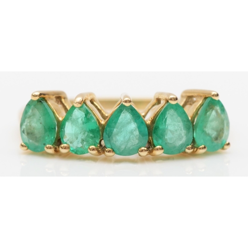 549 - A 9ct gold five stone pear cut emerald dress ring, M, 2.3gm.