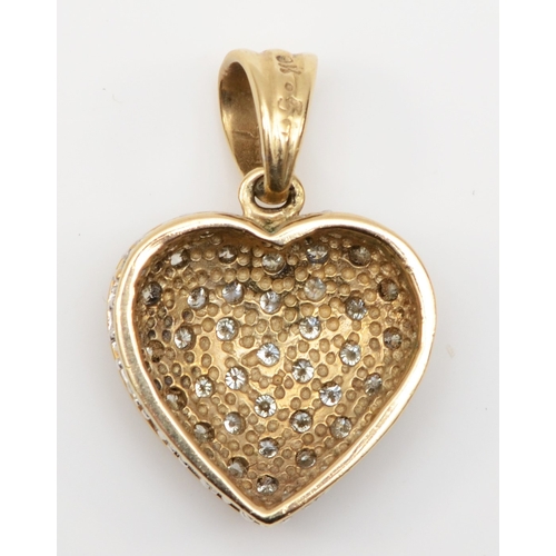 555 - A 9ct gold brilliant cut diamond cluster heart shaped pendant, 23 x 15mm, 2.8gm.