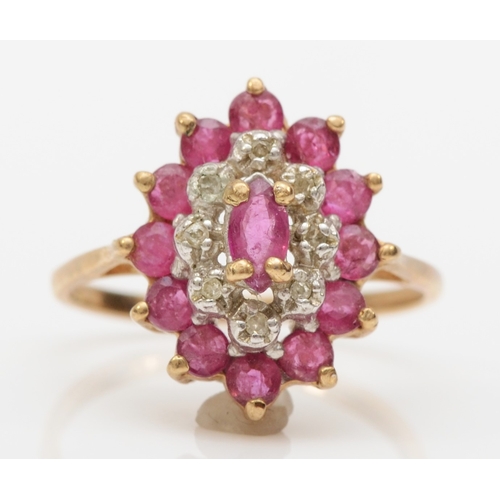 569 - A 9ct gold ruby and eight cut diamond dress ring, K, 2.1gm.