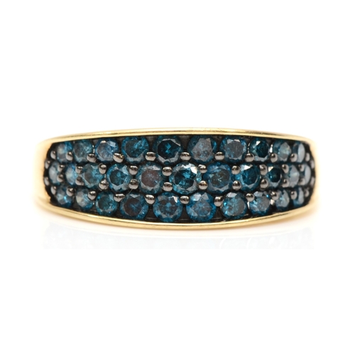 578 - A 9ct gold treated blue diamond cluster ring, O, 3gm.