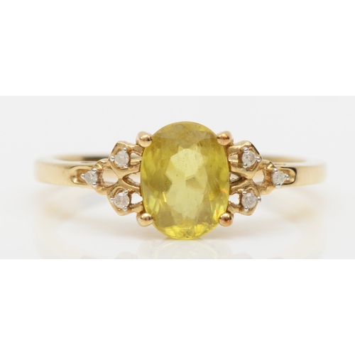 579 - A 9ct gold sphene and diamond dress ring, O, 2gm.