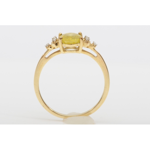 579 - A 9ct gold sphene and diamond dress ring, O, 2gm.