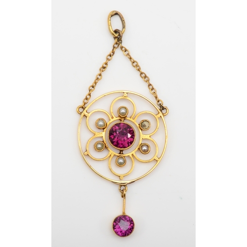 584 - An Edwardian unmarked gold garnet and seed pearl open work pendant, 30 x 19mm, 2gm.