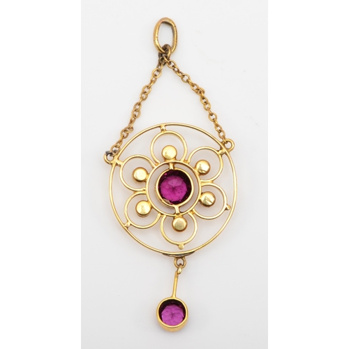 584 - An Edwardian unmarked gold garnet and seed pearl open work pendant, 30 x 19mm, 2gm.