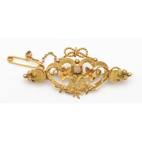 588 - A Victorian 9ct gold floral and heart brooch, Chester, base metal pin, 46 x 21mm, 3.6gm.