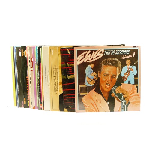 104 - Twenty four Elvis vinyl LPs, to include Hits Of The 70s. 40 Greatest Hits, Flaming Star, In Memphis,... 