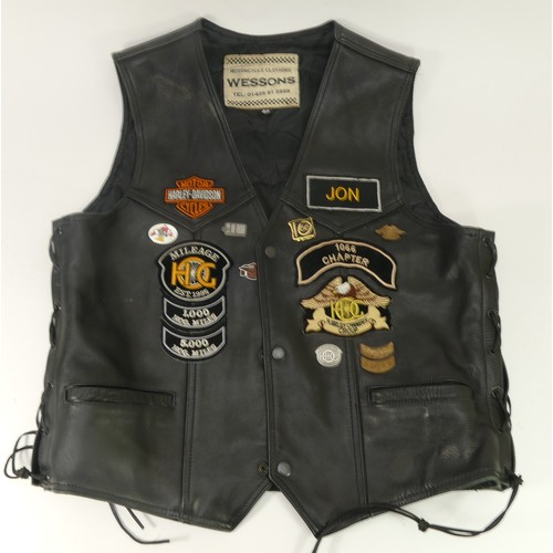 Harley Davidson '1066' Chapter, black leather waistcoat. HOG - Harley Owners Group badges, tours and 14 metal pin badges.
Branded Wessons, motorcycle clothing, side laces, one internal pocket, two external pockets. Size 42" (107cm) chest.