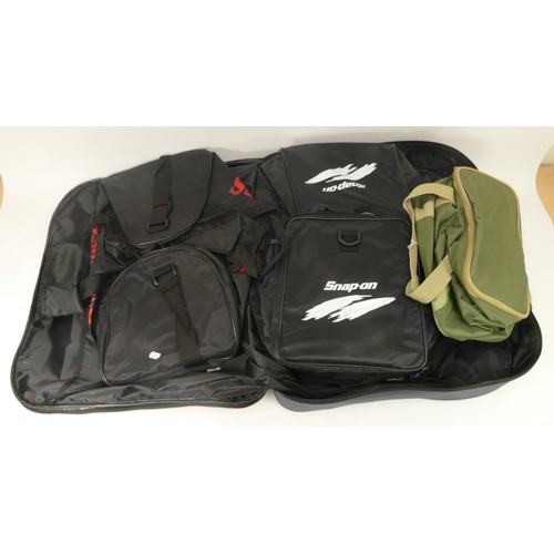 235 - Five Bags and holdalls to include:
Snap-on holdall, black, size 50 x 31cm
Jeff Banks travel bag with... 