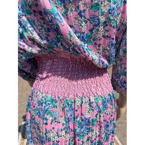 294 - Diane Freis Original, floral pink and blue one size georgette dress.
*Dummies, hats and props not in... 