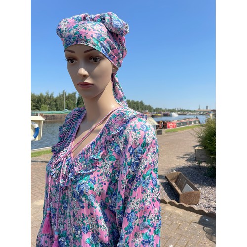 294 - Diane Freis Original, floral pink and blue one size georgette dress.
*Dummies, hats and props not in... 