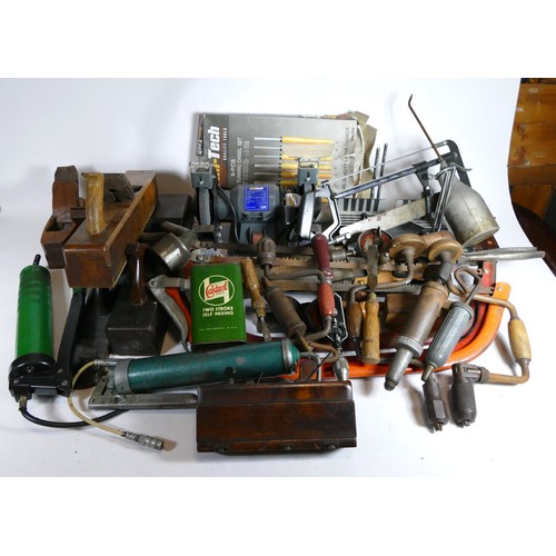 52 - A quantity of hand tools to include a Stanley No.7 wood plane, hand saws, drills and other equipment... 