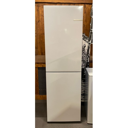 67 - A Bosch freestanding fridge/freezer, H184, W55, D55cm.