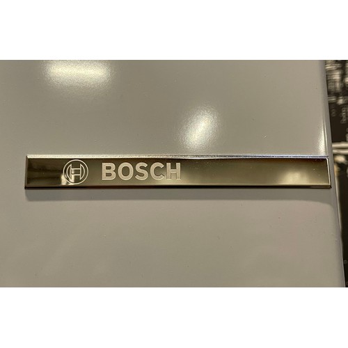 67 - A Bosch freestanding fridge/freezer, H184, W55, D55cm.