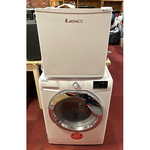 70 - A Hoover Dynamic washing machine, AAA rated, 1400 RPM, together with LEC table top larder fridge, H4... 